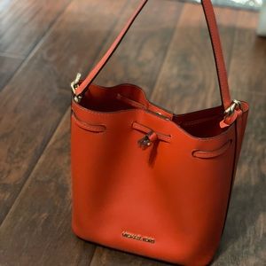 Michael Kors Bucket bag.  Burnt Orange in color.  Excellent condition
